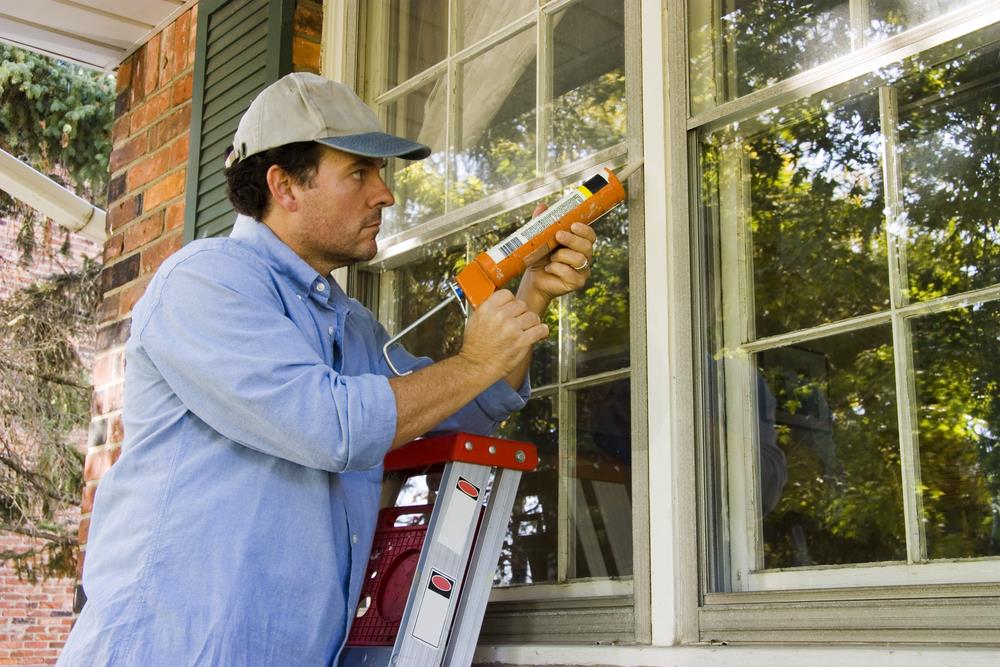 Image result for man fixing window